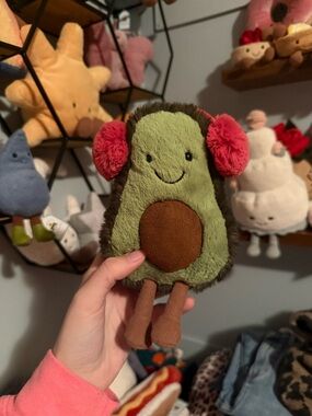 Jellycat Green Avocado Plush with Pink Ear Muffs